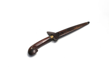 Old used Indonesian Knife with handle and knife scabbard made from wooden isolated on white background