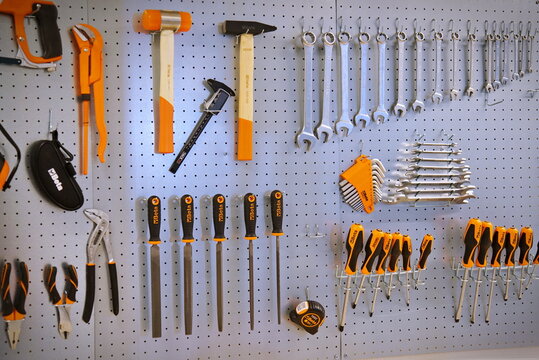 Milan, Italy - March 2018: Hand tools nicely organized at wall board