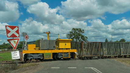 Empty Sugarcane Bins At Rail Crossing