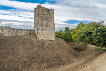 Restored medieval castle tower with moat at Essegvar Band in Veszprem county Hungary