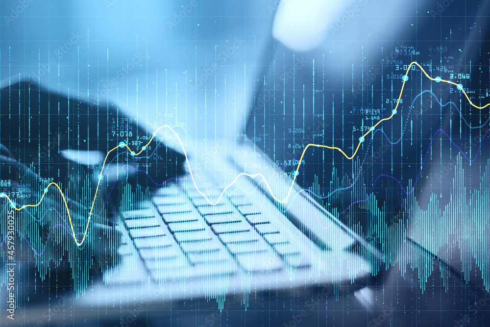 Poster close up of hand using laptop on blurry background with creative glowing forex chart background. fin