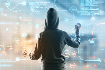 Hacker using abstract interface with glowing SEO hologram and icons on blurry background. Search...