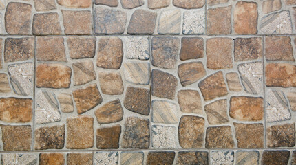 Stone pattern tiles. Ceramic finish. Brown-gray background. Finishing material for the floor. Imitation marble. Interior and exterior decoration. Vintage style. Geometric square shape. Natural design