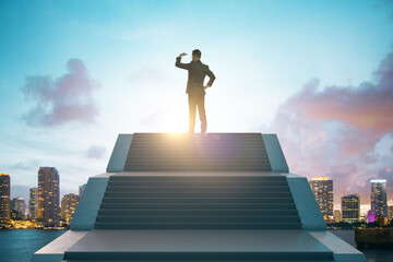 Fototapeta na wymiar Back view of young european businessman standing on top of stairs on bright city background with sky view. Leadership, growth and success concept.