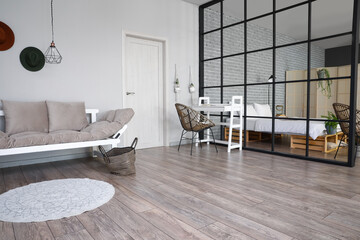 Interior of stylish room with folding screen