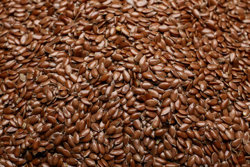 Flax seeds as background, closeup