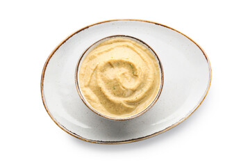 Plate and bowl with tasty baba ghanoush on white background