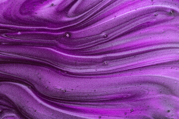 Purple glitter texture with sequins. Shining background