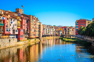 Fototapeta na wymiar Famous colorful houses at river Onyar in Girona, Catalonia, Spain