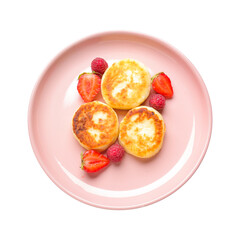 Plate with cottage cheese pancakes and strawberries on white background