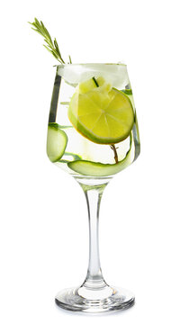 Glass Of Cold Gin Tonic And Cucumber Slices On White Background