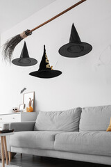 Interior of living room with creative witch's decorations for Halloween