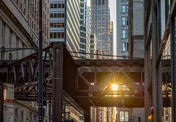 In Chicago, the sun shines brightly through space in the train tracks of the famous L or Elevated...