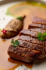 Close up of hot and fresh tenderloin with meat juice around, commercial photo