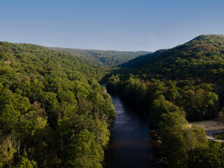 Obraz premium Mountain and river in the woods blue sky - aerial