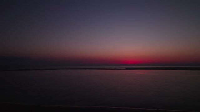 Aerial view of a colorful sunset over the horizon