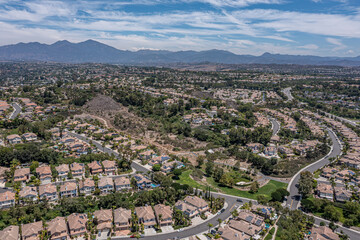 An aerial view and an upscale modern California neighborhood