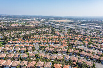 Aerial view of rows of homes in a suburban master planned community