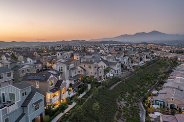Sunset of an upscale Southern California neighborhood, master planned modern community