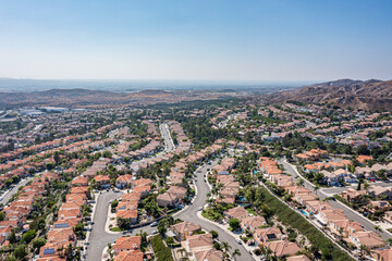 Aerial view of a master planned coastal community, homes ocean on a clear day