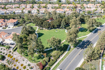 Aerial view of a grassy park in an upscale master planned community