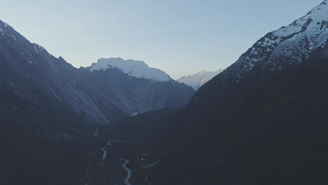 Majestic dark Marshyangdi river valley with snowy Paungda Danga (4,730 m) mountain, Annapurna Circuit, Nepal