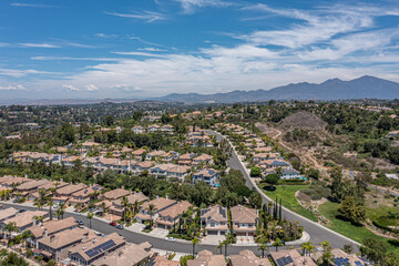 Aerial view of master planned homes in the hills of Orange County California.