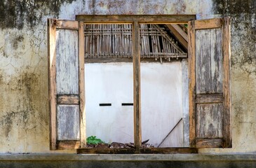 Old broken wooden window in Yogyakarta, Indonesia
