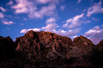 Clouds Streaking Over Chisos Mountains at Sunset