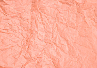 Crumpled pastel pink paper abstract background texture