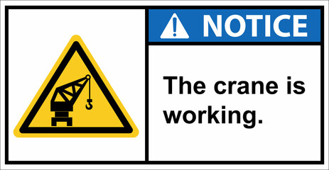 Be careful, the crane is working.,Notice sign.