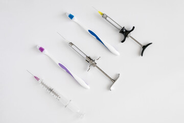 Dentistry medical tools syring on white background.