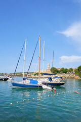 Fototapeta na wymiar Boats in the port of Krk on the island of the same name Krk on the Adriatic Sea in Croatia