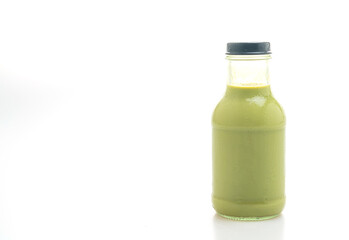 matcha green tea latte in glass bottle