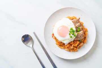 Kimchi fried rice with fried egg and pork