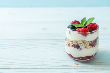 homemade raspberry and blueberry with yogurt and granola