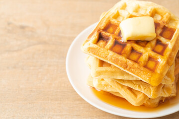 waffle stack with butter and honey