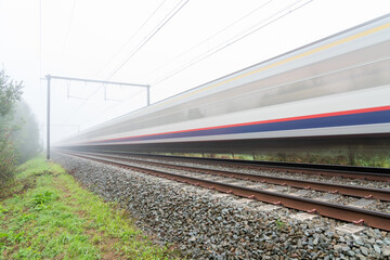 Fototapeta premium Foggy morning whit train