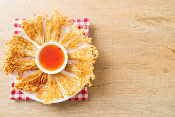 deep fried enoki mushroom or golden needle mushroom with spicy dipping sauce