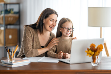 Girl doing homework or online education.