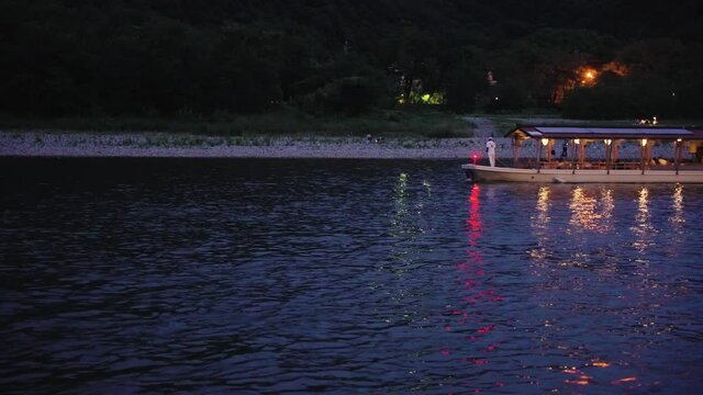 Cormorant Fishing (Ukai) Viewing boat travels up Nagara River, Gifu at Twilight
