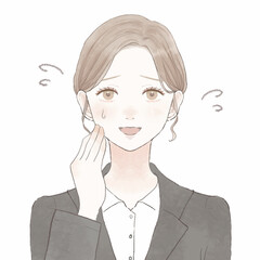 愛想笑いをするスーツを着た女性