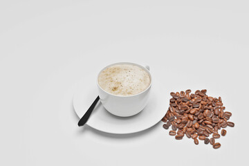 coffee cup nand coffee beans on the white background 