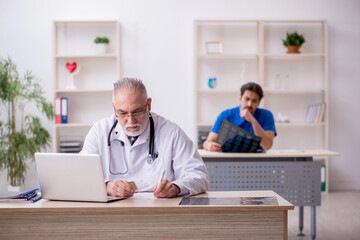 Two male doctors working in the clinic