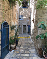 Scenic street alley view of historic houses and buildings in Old Town downtown Yaffa Jaffa, Israel...