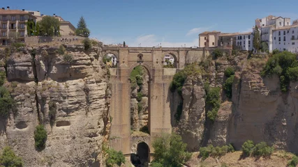 Papier peint adhésif Ronda Pont Neuf Aerial view over Puente Nuevo Ronda Town, Spain   Ronda is a town in the Spanish province of Málaga, drone, 2021 