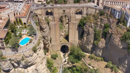 Photo sur Plexiglas Ronda Pont Neuf Aerial view over Puente Nuevo Ronda Town, Spain   Ronda is a town in the Spanish province of Málaga, drone, 2021 