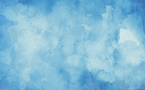 Blue watercolor background texture, blotches of watercolor paint, textured grainy paper, light blue wash with abstract blob design