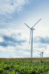 Multiple spinning windmills in Hokkaido, Japan