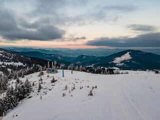 aerial sunset view above ski resort